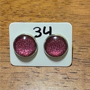I am selling earrings. They are homemade earrings. Pink cheetah earrings.